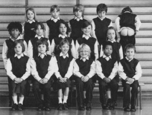 Yearbook photos of young kids with one mooning the camera.
