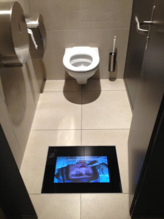Movie theater bathrooms with built-in movie screens. So you won't miss!