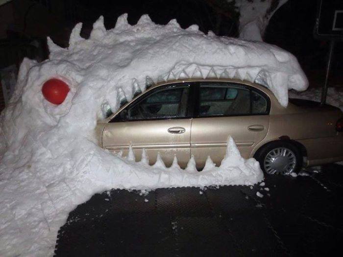 Ice sculpture car in dragon's mouth